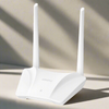 White router with antennas on a light background